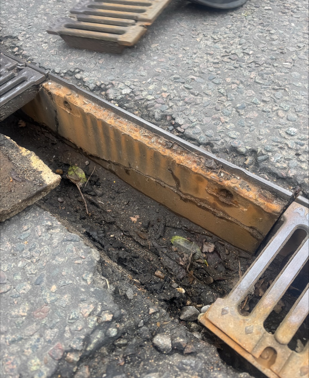 ACO rainwater drain repair report image 4